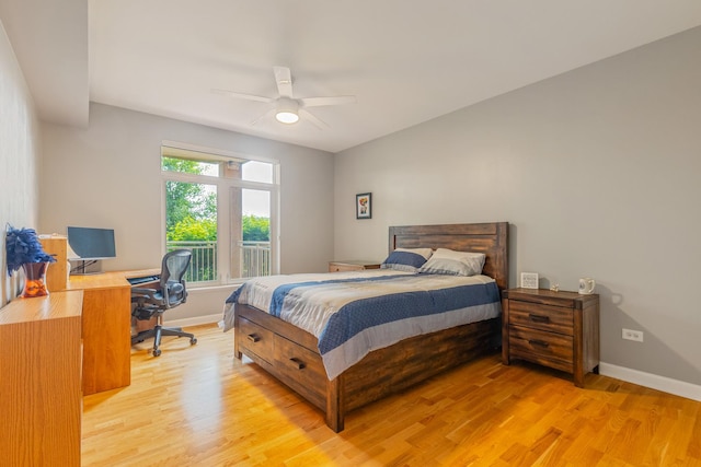 8340 Callie Ave Unit 105, Morton Grove, IL 60053 - bedroom with light wood-style floors, a desk, and ceiling fan