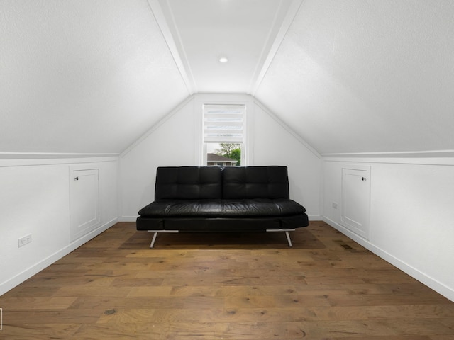 7225 Poplar Ln, Darien, IL 60561 - sitting room with vaulted ceiling, wood finished floors, and baseboards
