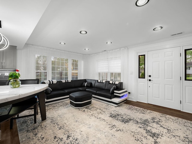7225 Poplar Ln, Darien, IL 60561 - living room featuring wood finished floors, recessed lighting, and ornamental molding