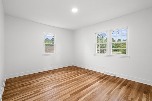 826 Iris Ln, Naperville, IL 60540 - empty room with baseboards and light wood finished floors