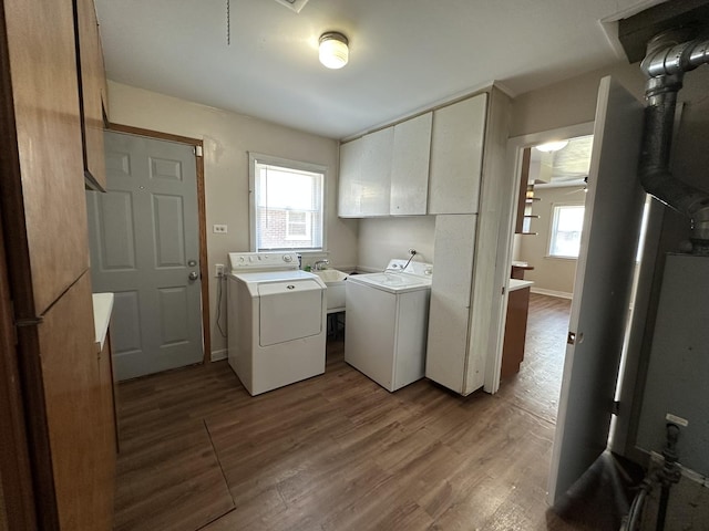 14631 Michigan Ave, Dolton, IL 60419 - washroom with washing machine and clothes dryer, wood finished floors, cabinet space, and baseboards