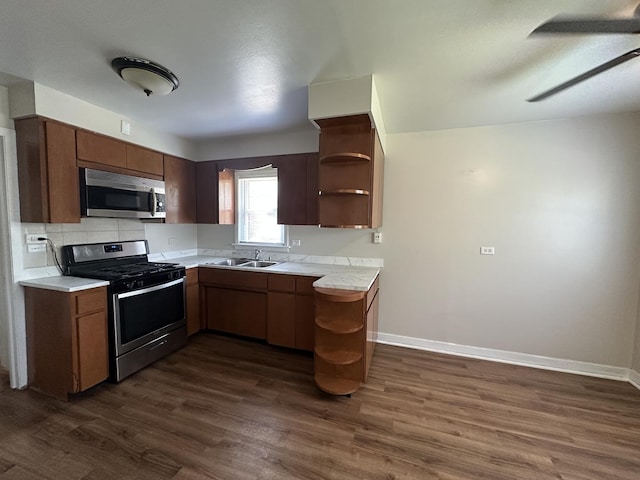 14631 Michigan Ave, Dolton, IL 60419 - kitchen featuring stainless steel appliances, open shelves, a sink, dark wood-type flooring, and baseboards