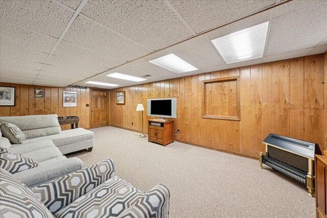 10 S Canterbury Rd, Aurora, IL 60506 - carpeted living area featuring wooden walls and a drop ceiling