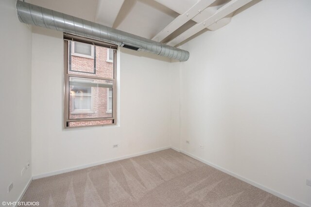 500 S Clinton St Unit 604, Chicago, IL 60607 - basement featuring carpet flooring and baseboards