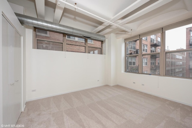 500 S Clinton St Unit 604, Chicago, IL 60607 - carpeted empty room featuring baseboards