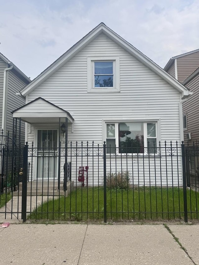 2103 N Long Ave, Chicago, IL 60639 - view of property exterior with a fenced front yard