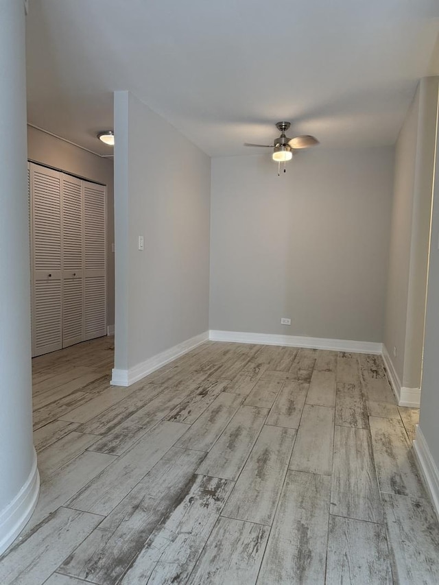 4508 Beau Monde Dr Unit 5, Lisle, IL 60532 - empty room with a ceiling fan and wood finished floors