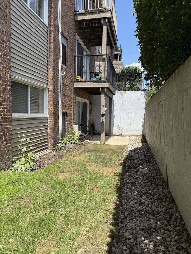 4508 Beau Monde Dr Unit 5, Lisle, IL 60532 - rear view of property with a balcony and brick siding