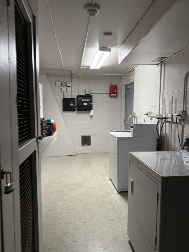 4508 Beau Monde Dr Unit 5, Lisle, IL 60532 - washroom with independent washer and dryer, light flooring, and concrete block wall