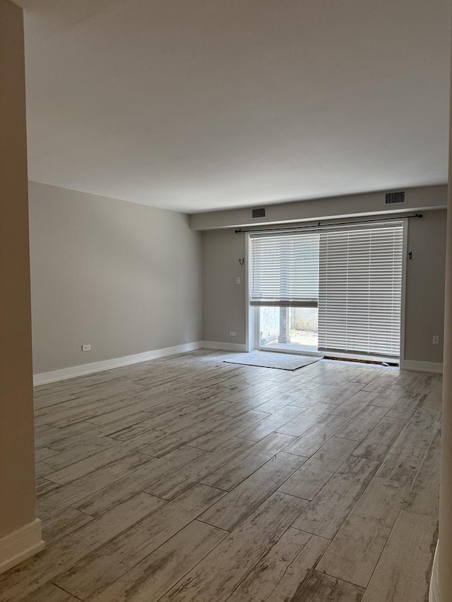 4508 Beau Monde Dr Unit 5, Lisle, IL 60532 - spare room with wood finished floors and baseboards