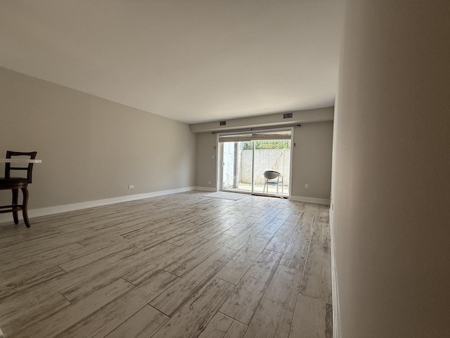 4508 Beau Monde Dr Unit 5, Lisle, IL 60532 - spare room featuring wood finished floors and baseboards