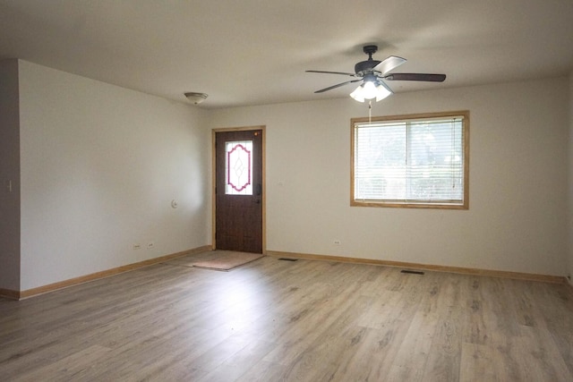 468 Independence Ln, Bolingbrook, IL 60440 - entryway featuring ceiling fan, baseboards, and light wood-type flooring