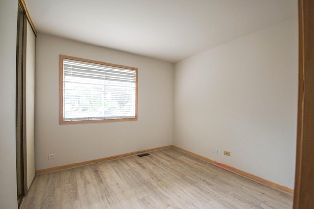 468 Independence Ln, Bolingbrook, IL 60440 - unfurnished room with light wood-type flooring and baseboards