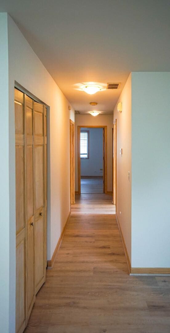 468 Independence Ln, Bolingbrook, IL 60440 - hallway with light wood finished floors and baseboards
