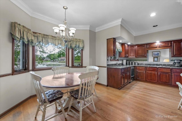 25827 W Andrew Ct, Ingleside, IL 60041 - dining space with a chandelier, ornamental molding, light wood-type flooring, baseboards, and recessed lighting