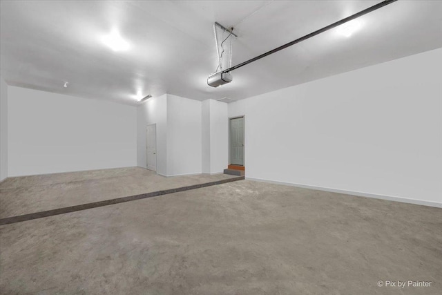 25827 W Andrew Ct, Ingleside, IL 60041 - garage featuring a garage door opener