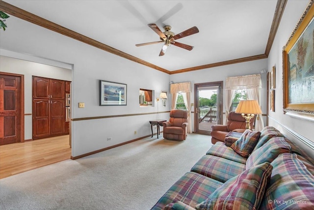 25827 W Andrew Ct, Ingleside, IL 60041 - living room featuring light colored carpet, baseboards, ornamental molding, and ceiling fan
