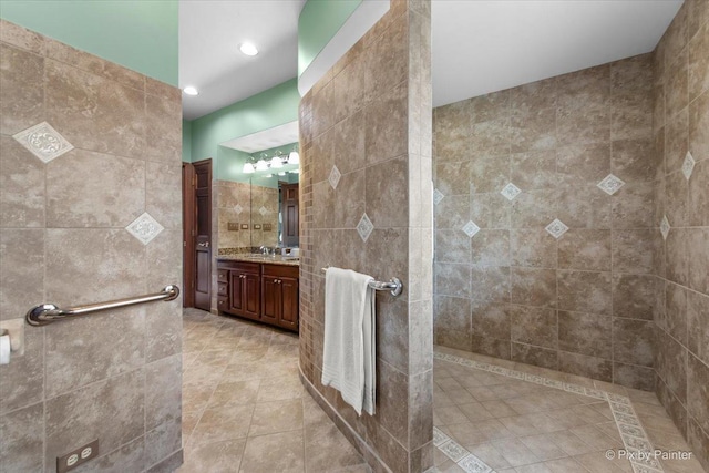 25827 W Andrew Ct, Ingleside, IL 60041 - full bathroom with tile walls, vanity, tile patterned floors, and walk in shower