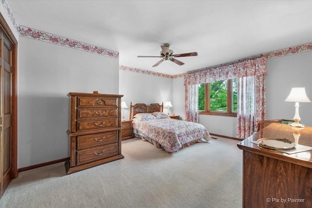 25827 W Andrew Ct, Ingleside, IL 60041 - bedroom with light colored carpet, baseboards, and ceiling fan