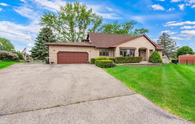 25827 W Andrew Ct, Ingleside, IL 60041 - view of front of property featuring an attached garage, driveway, brick siding, and roof with shingles