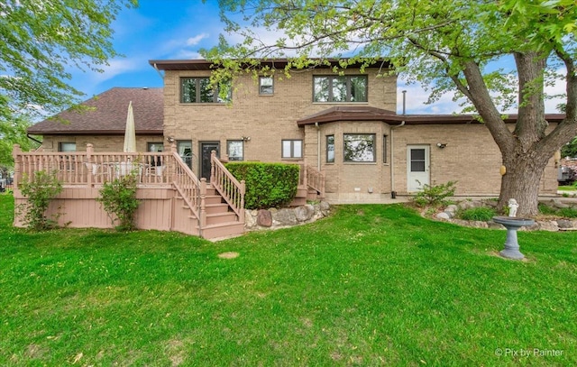 25827 W Andrew Ct, Ingleside, IL 60041 - back of house featuring a wooden deck, a lawn, brick siding, and stairs