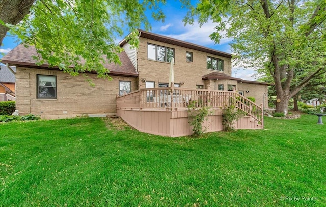 25827 W Andrew Ct, Ingleside, IL 60041 - rear view of house with a lawn, a deck, and brick siding