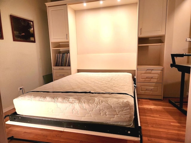 1530 S State St Unit 17R, Chicago, IL 60605 - bedroom with wood finished floors and recessed lighting