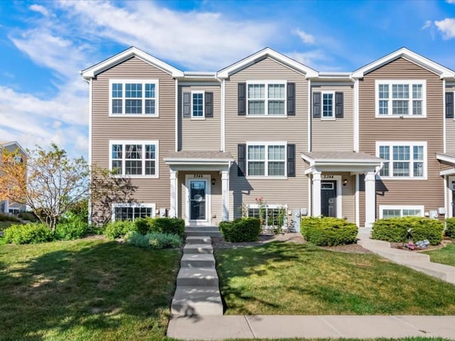 2346 Aurora Dr, Pingree Grove, IL 60140 - townhome / multi-family property featuring a front lawn