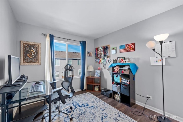 2346 Aurora Dr, Pingree Grove, IL 60140 - home office featuring dark wood-style flooring and baseboards