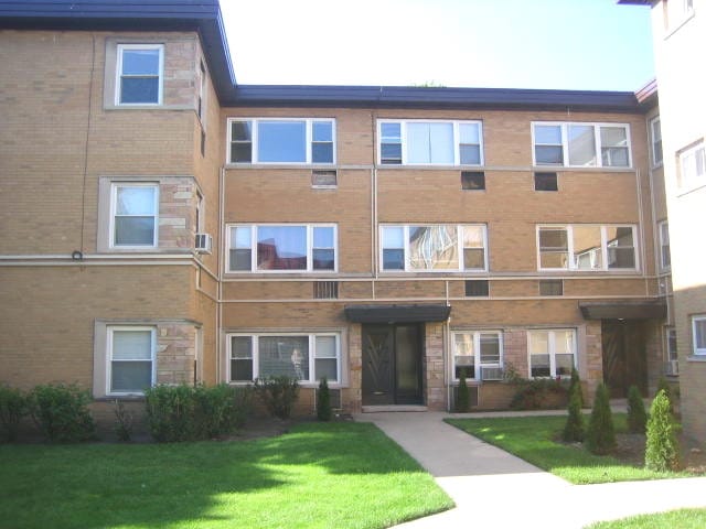 6835 N Seeley Ave Unit 3N, Chicago, IL 60645 - view of apartment building / complex with cooling unit