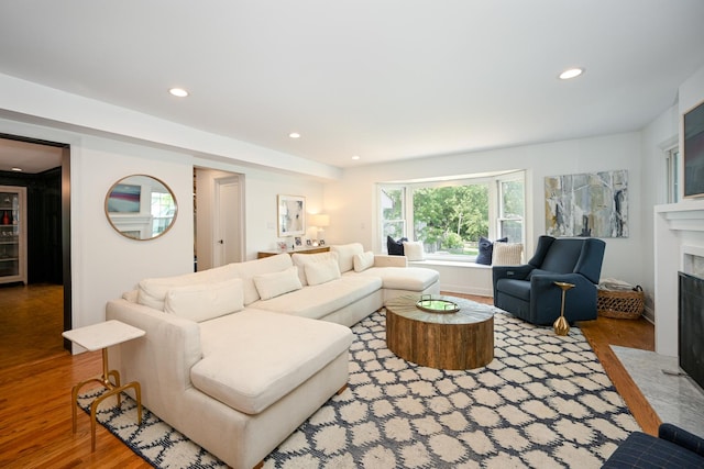 714 Turner Ave, Glen Ellyn, IL 60137 - living room featuring a fireplace with flush hearth, wood finished floors, and recessed lighting