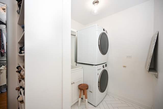 714 Turner Ave, Glen Ellyn, IL 60137 - washroom with stacked washer / drying machine and cabinet space
