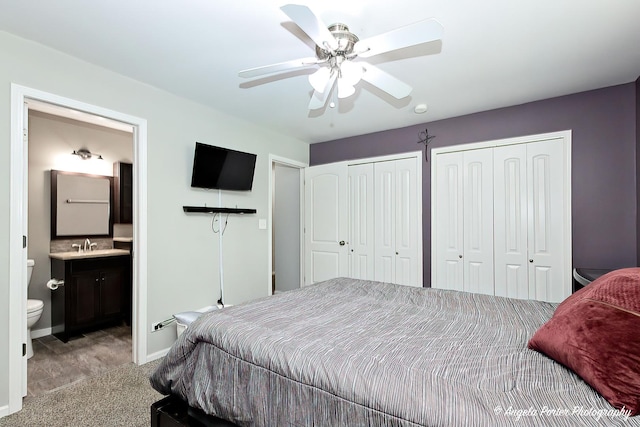 1381 Regency Ln, Lake Villa, IL 60046 - bedroom with two closets, carpet, ensuite bathroom, baseboards, and a sink