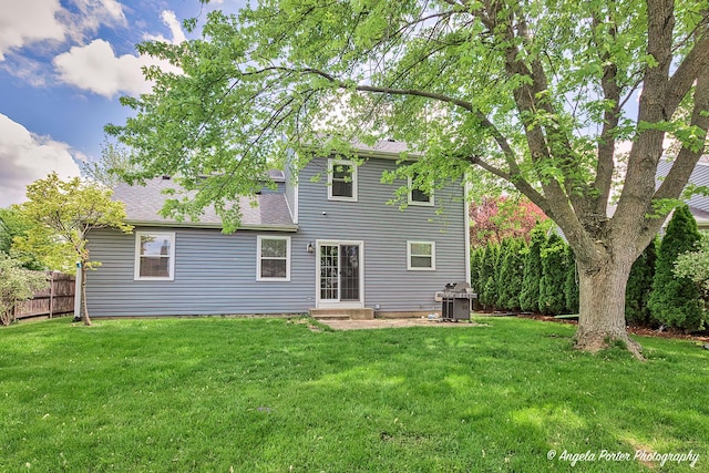 1381 Regency Ln, Lake Villa, IL 60046 - back of property with a shingled roof