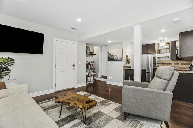 1946 W Newport Ave Unit 1E, Chicago, IL 60657 - living area featuring wood finished floors, baseboards, and recessed lighting
