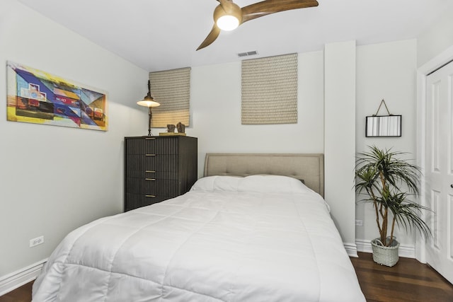 1946 W Newport Ave Unit 1E, Chicago, IL 60657 - bedroom with baseboards, wood finished floors, and ceiling fan