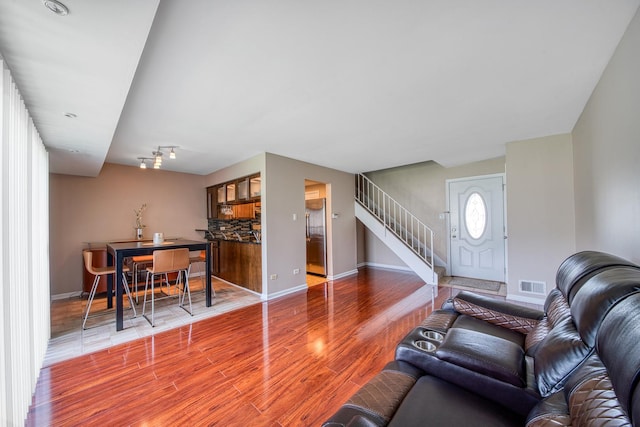 8 Cour Masson Cir Unit 0, Palos Hills, IL 60465 - living room with stairs, wood finished floors, and baseboards