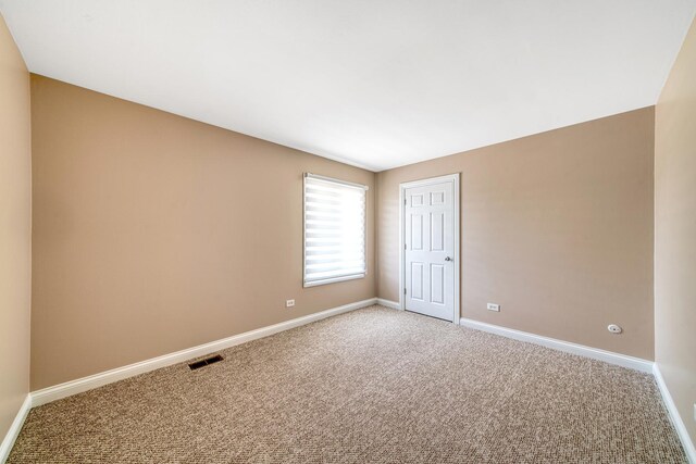 8 Cour Masson Cir Unit 0, Palos Hills, IL 60465 - unfurnished room with light colored carpet and baseboards