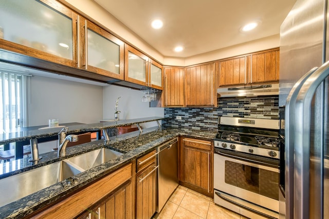 8 Cour Masson Cir Unit 0, Palos Hills, IL 60465 - kitchen with appliances with stainless steel finishes, under cabinet range hood, brown cabinets, a sink, and light tile patterned flooring