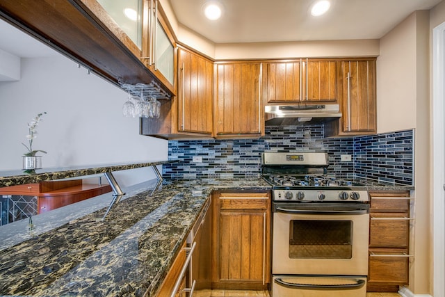 8 Cour Masson Cir Unit 0, Palos Hills, IL 60465 - kitchen featuring stainless steel gas stove, under cabinet range hood, brown cabinets, and backsplash
