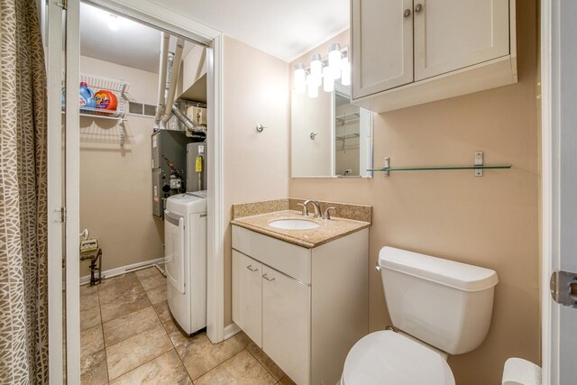 8 Cour Masson Cir Unit 0, Palos Hills, IL 60465 - full bathroom with washer / dryer, vanity, toilet, and water heater