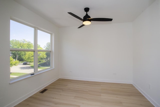 34382 N Aster Ct, Round Lake Beach, IL 60073 - empty room with light wood-style floors, baseboards, and a ceiling fan