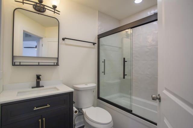 34382 N Aster Ct, Round Lake Beach, IL 60073 - full bathroom featuring toilet, vanity, and shower / bath combination with glass door