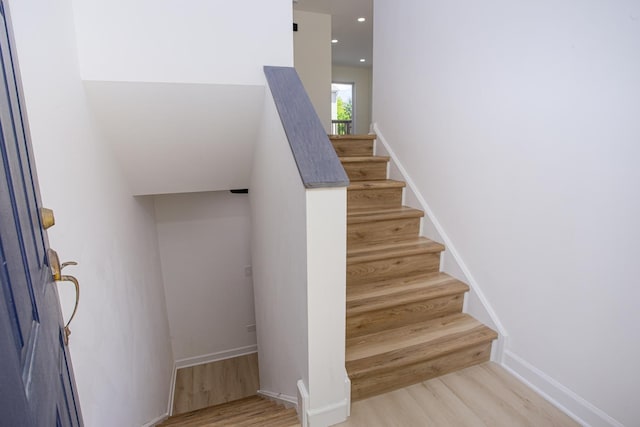 34382 N Aster Ct, Round Lake Beach, IL 60073 - stairway featuring wood finished floors, baseboards, and recessed lighting