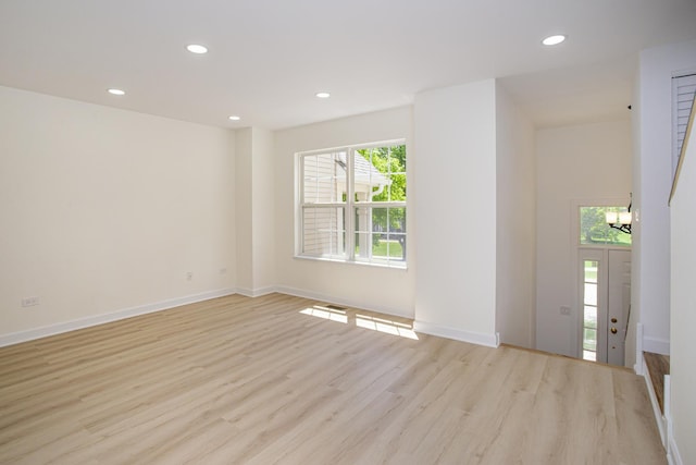 34382 N Aster Ct, Round Lake Beach, IL 60073 - empty room featuring light wood-style flooring, recessed lighting, and baseboards