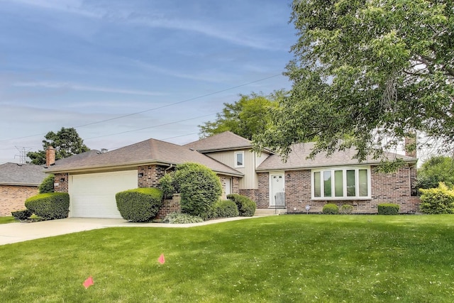 8923 Pebble Beach Ln, Orland Park, IL 60462 - tri-level home featuring brick siding, a front lawn, an attached garage, a chimney, and concrete driveway