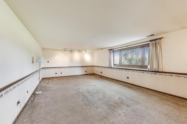 8923 Pebble Beach Ln, Orland Park, IL 60462 - carpeted empty room with rail lighting