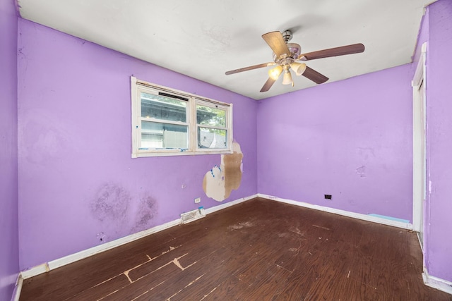 505 E 146th St, Dolton, IL 60419 - empty room featuring wood finished floors, baseboards, and ceiling fan