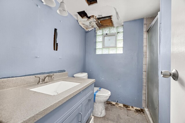 505 E 146th St, Dolton, IL 60419 - bathroom with toilet, a stall shower, and vanity