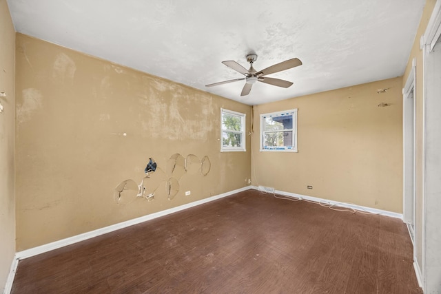 505 E 146th St, Dolton, IL 60419 - empty room with wood finished floors, ceiling fan, and baseboards